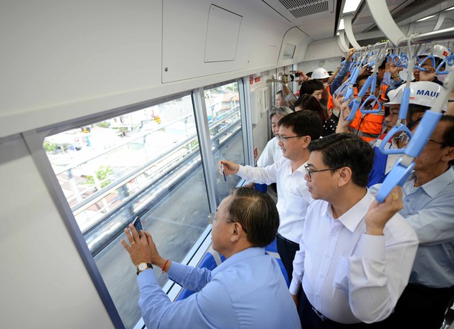 Cận cảnh đoàn tàu metro Bến Thành - Suối Tiên chạy thử qua 5 nhà ga - Ảnh 9.