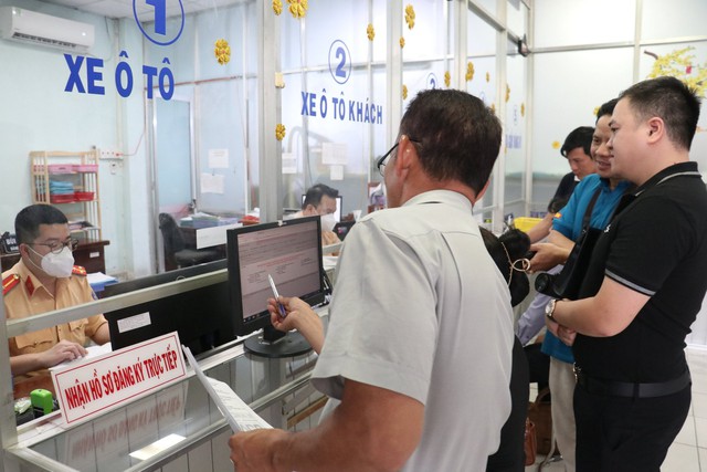 Điều chỉnh việc tiếp nhận, giải quyết thủ tục đăng ký xe ô tô - Ảnh 1. Điều chỉnh việc tiếp nhận, giải quyết thủ tục đăng ký xe ô tô - Ảnh 1.