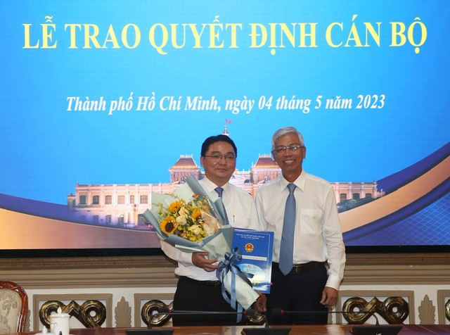 Ông Nguyễn Trần Bình làm Chủ tịch UBND Quận 11 - Ảnh 1.
