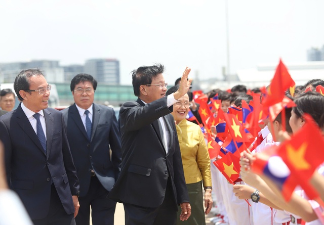 Tổng Bí thư, Chủ tịch nước Lào cùng Phu nhân đến TPHCM- Ảnh 3.