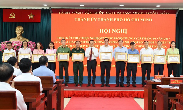TPHCM cơ bản hoàn thành mục tiêu sắp xếp tinh gọn tổ chức bộ máy- Ảnh 2. TPHCM cơ bản hoàn thành mục tiêu sắp xếp tinh gọn tổ chức bộ máy- Ảnh 2.