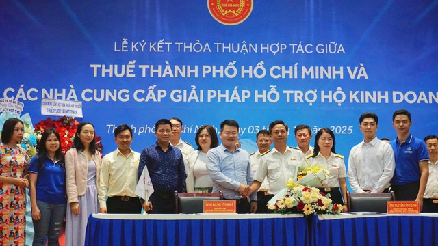 Hỗ trợ trực tiếp, tận nơi các hộ kinh doanh chuyển đổi sang kê khai thuế- Ảnh 1.