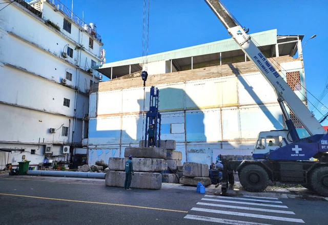 Thành phố phân cấp thẩm quyền cấp giấy phép xây dựng- Ảnh 1.