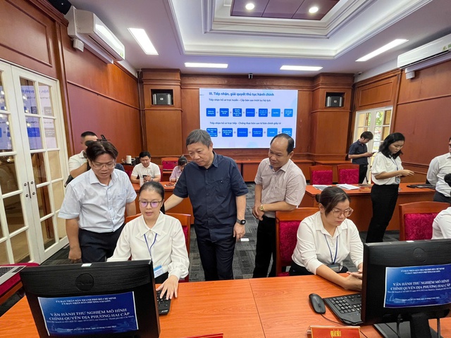 Thành phố chính thức vận hành thử nghiệm mô hình chính quyền địa phương 2 cấp- Ảnh 2. Thành phố chính thức vận hành thử nghiệm mô hình chính quyền địa phương 2 cấp- Ảnh 2.