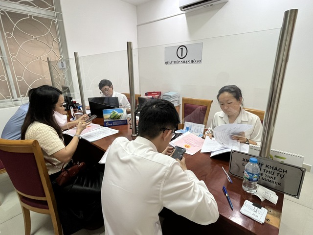 Các xã, phường cơ bản thực hiện thông suốt hồ sơ lĩnh vực đất đai - Ảnh 1. Các xã, phường cơ bản thực hiện thông suốt hồ sơ lĩnh vực đất đai - Ảnh 1.