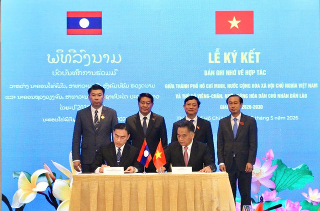 TPHCM và Thủ đô Viêng Chăn mở rộng hợp tác toàn diện giai đoạn mới- Ảnh 2.