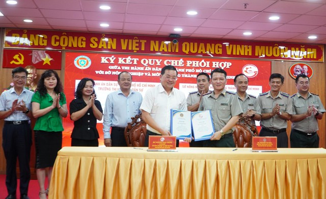 TPHCM ký quy chế phối hợp trong thi hành án lĩnh vực đất đai- Ảnh 1. TPHCM ký quy chế phối hợp trong thi hành án lĩnh vực đất đai- Ảnh 1.