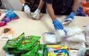 TPHCM: Bắt gần 26 kg ma túy cất giấu trong các gói kẹo, cà phê